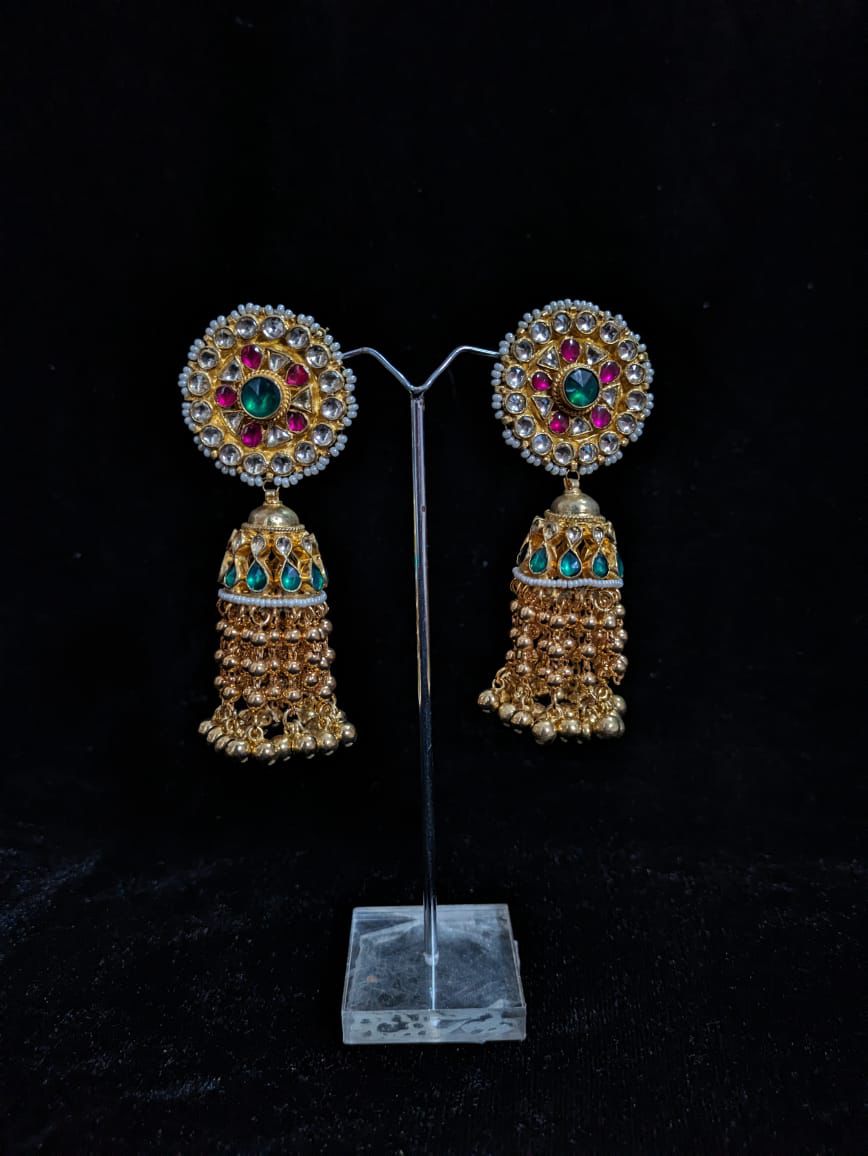 "Golden Jhumka with Emerald and Pink Accents"