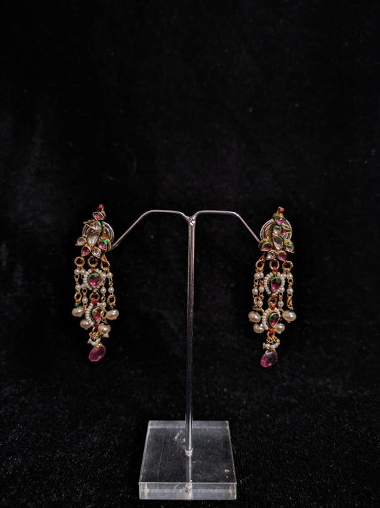 "Traditional Kundan Jhumkas with Coral Accents"